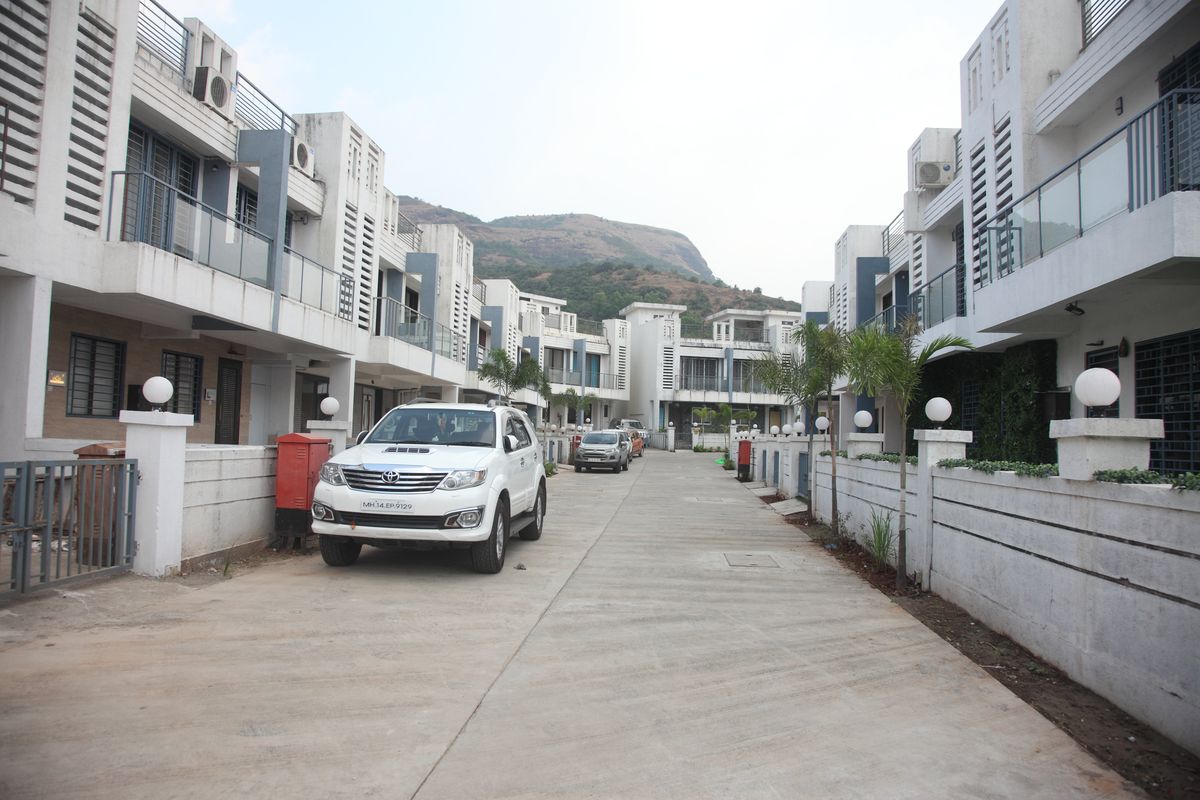 The villa row at Sun Palms with the hills behind
