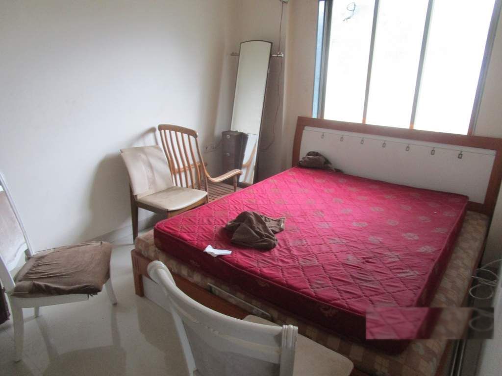 Bedroom with seating by the window