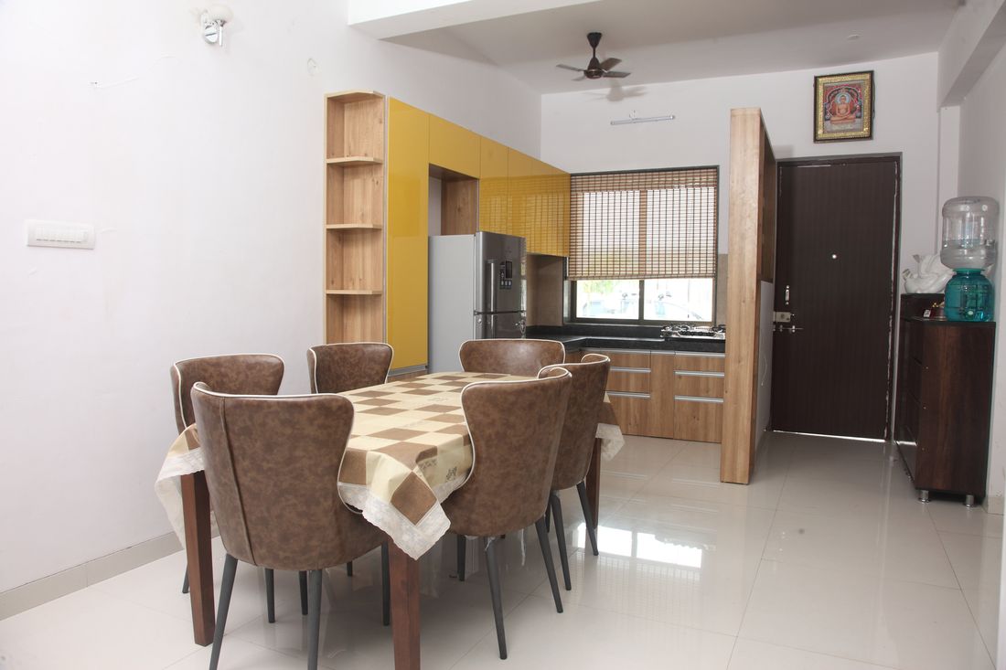 Dining table beside the open kitchen