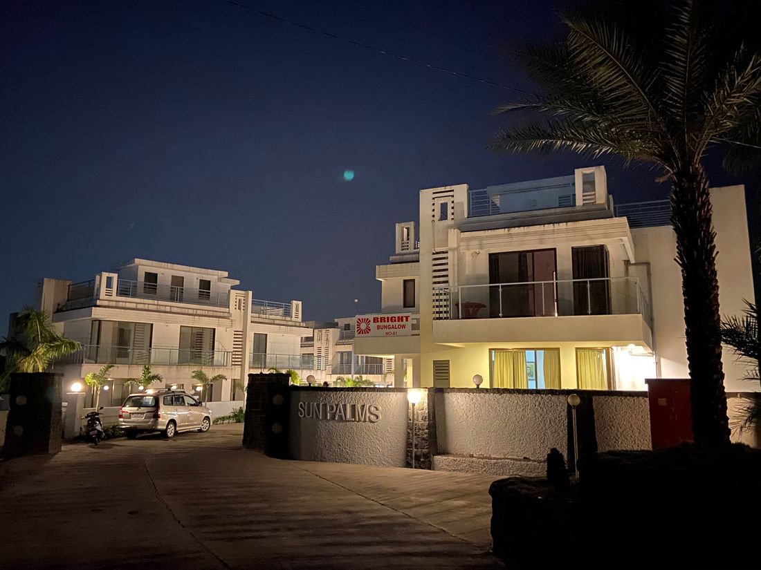 Sun Palms villas lit up after dark